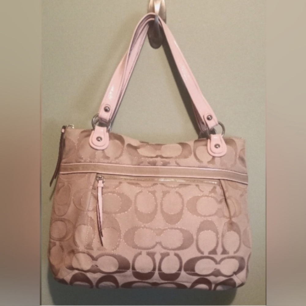 Like new large Coach Tote in blush pink with metallic trimmed Cs